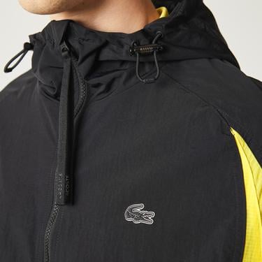  Lacoste Active Erkek Kapüşonlu Baskılı Renk Bloklu Siyah Yağmurluk