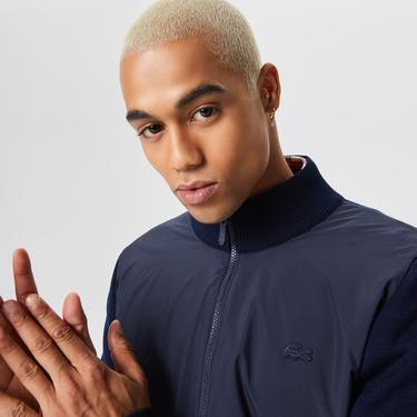  Lacoste Erkek Dik Yaka Renk Bloklu Fermuarlı Lacivert Kazak