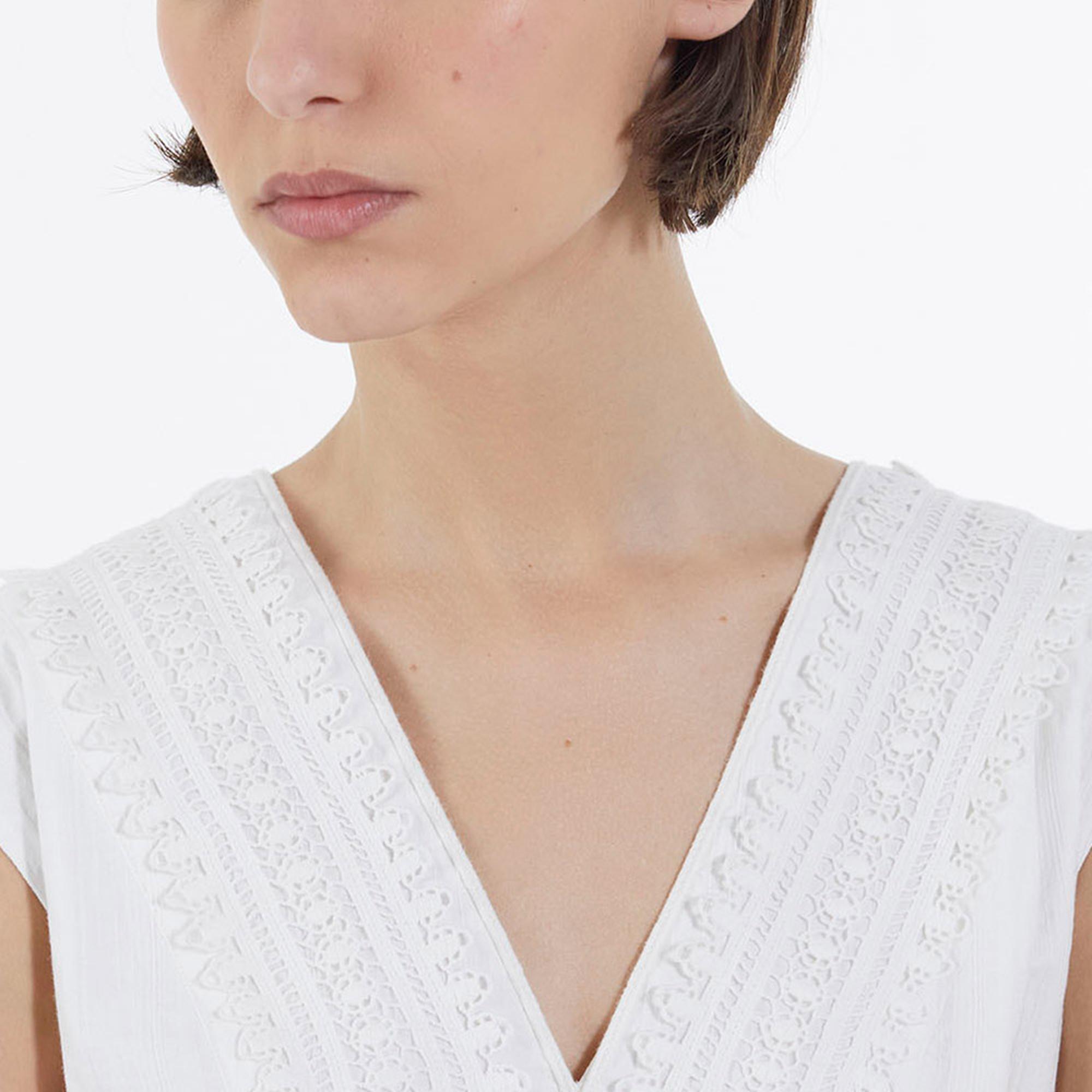 KADIN KOLSUZ BEYAZ NAKIŞLI UZUN ELBİSE