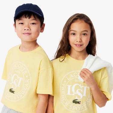  Lacoste Çocuk Bisiklet Yaka Baskılı Sarı T-Shirt