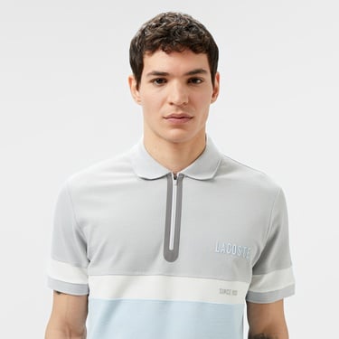  Lacoste Erkek Regular Fit Yarım Fermuarlı Renk Bloklu Açık Mavi Polo