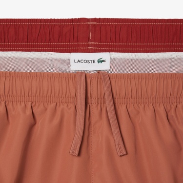  Lacoste Erkek Renk Bloklu Turuncu Deniz Şortu