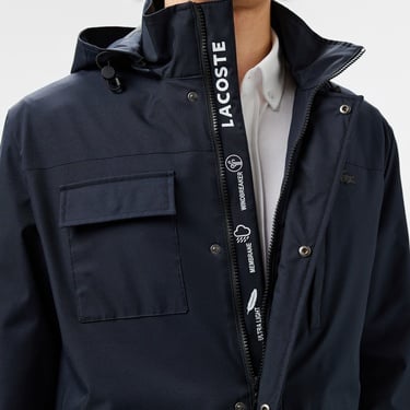  Lacoste Erkek Regular Fit Kapüşonlu Baskılı Lacivert Yağmurluk