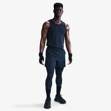  Nike Dri-Fit Primary Erkek Mavi Kolsuz T-Shirt