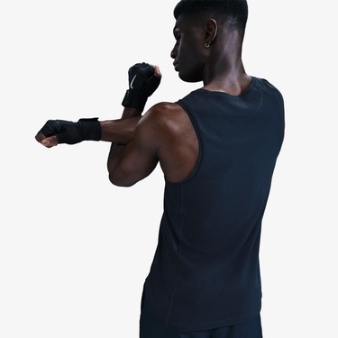  Nike Dri-Fit Primary Erkek Mavi Kolsuz T-Shirt