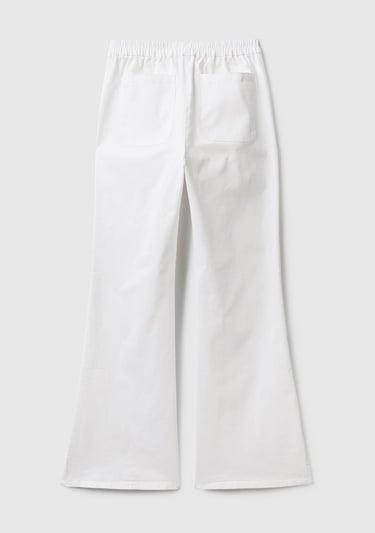  Kadın Beyaz Paçası Yırtmaçlı Pantolon