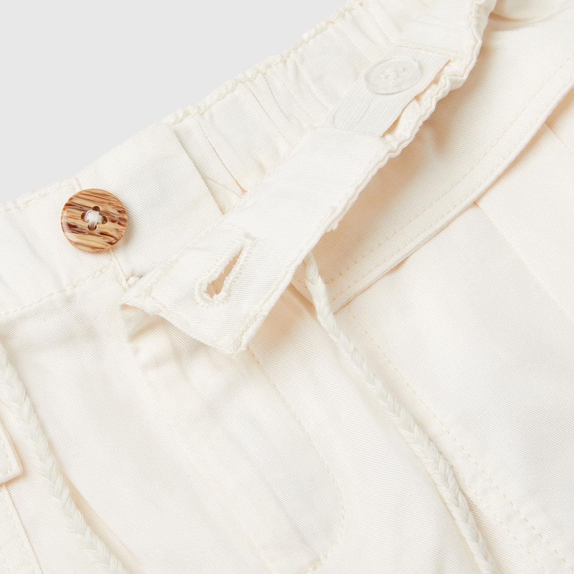 Kız Çocuk Krem Arkası Elastik Bantlı Büzgü İpli Yama Cepli Şort