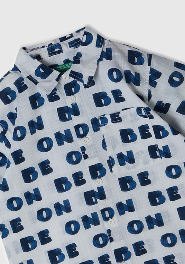  Erkek Çocuk Beyaz-Lacivert Tamamı Desenli Yama Cepli Kısa Kollu Gömlek