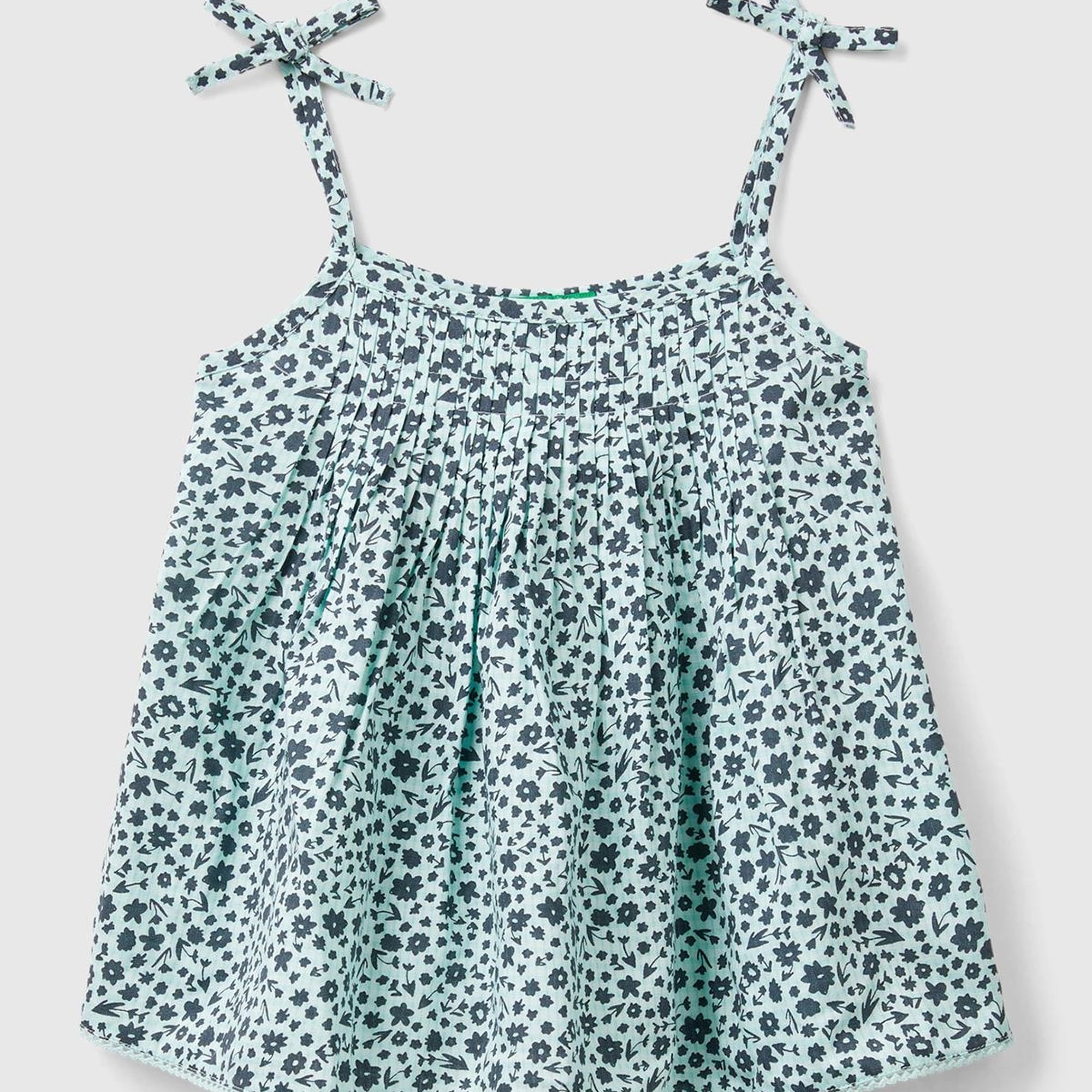 Kız Çocuk Açık Mavi Mix Önü ve Arkası Kıvrım Detaylı Fiyonk Askılı Desenli Bluz