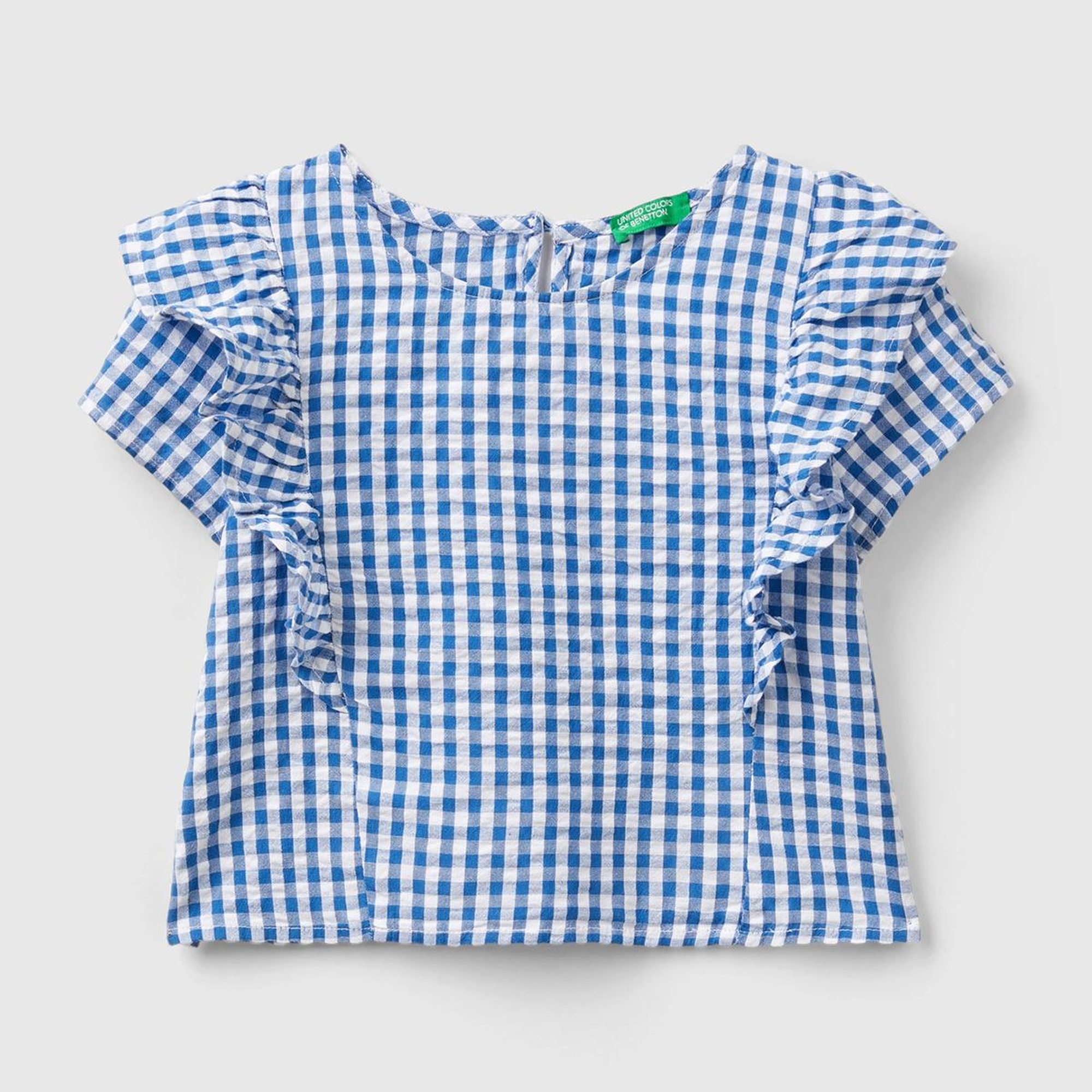 Kız Çocuk Mavi-Beyaz Tamamı Desenli Önü ve Arkası Fırfır Detaylı Düğmeli Bluz