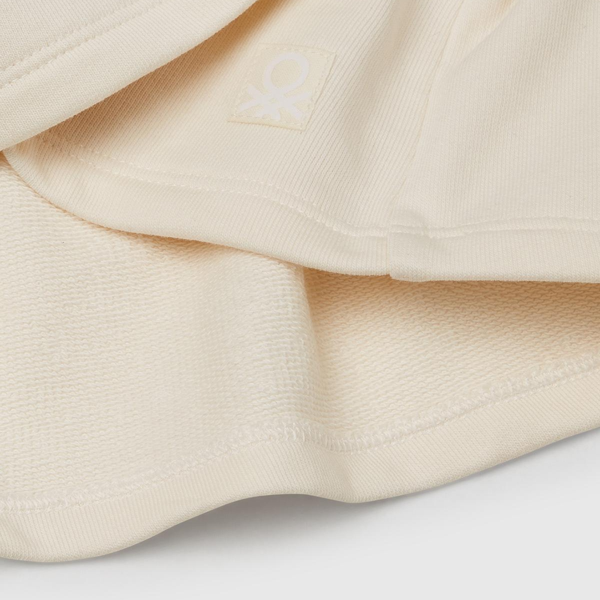 Kız Çocuk Ekru Logo Etiketli Pileli Bel Bantlı Etek