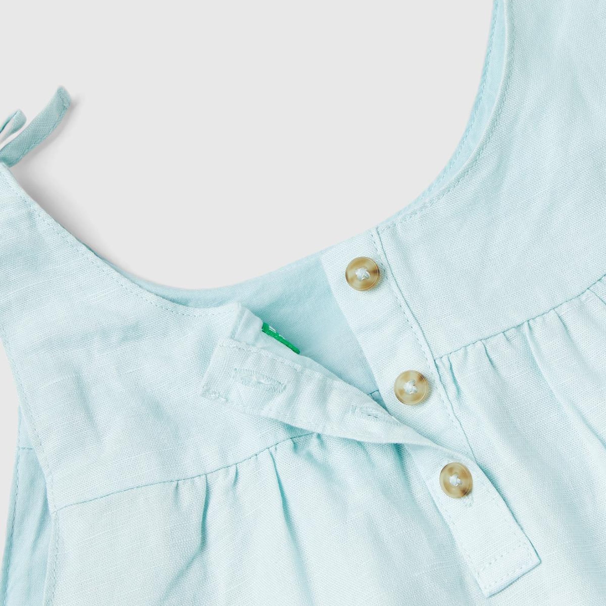 Kız Çocuk Açık Mavi Fiyonk Askılı Pileli Rahat Kesim Elbise