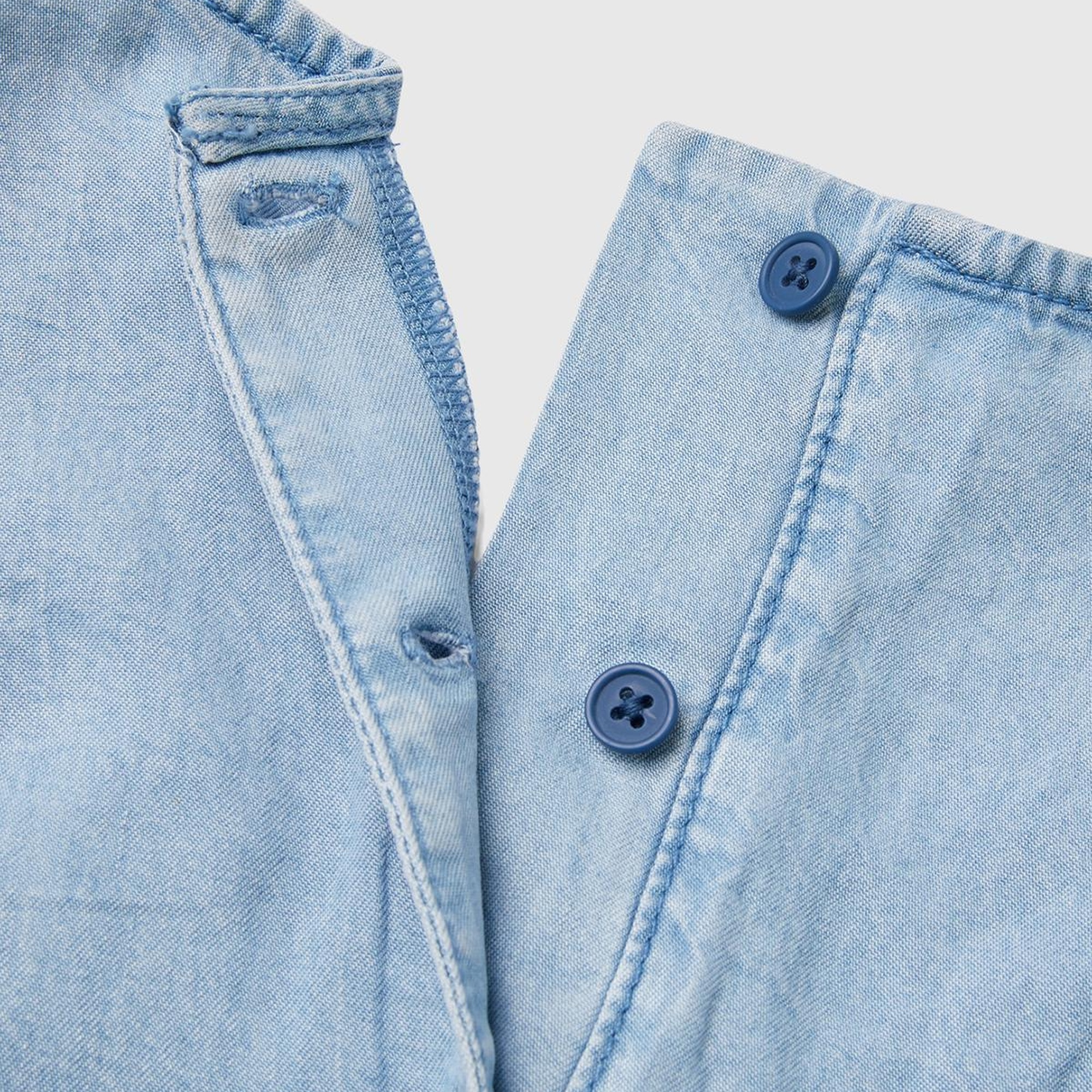 Kız Çocuk Açık Denim %100 Liyosel Beli Kuşaklı Ucu Fırfırlı Kolsuz Kısa Tulum