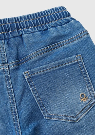  Erkek Çocuk Koyu Denim Arka Cebi Logolu Lastik Paça Ağartılmış Denim Pantolon