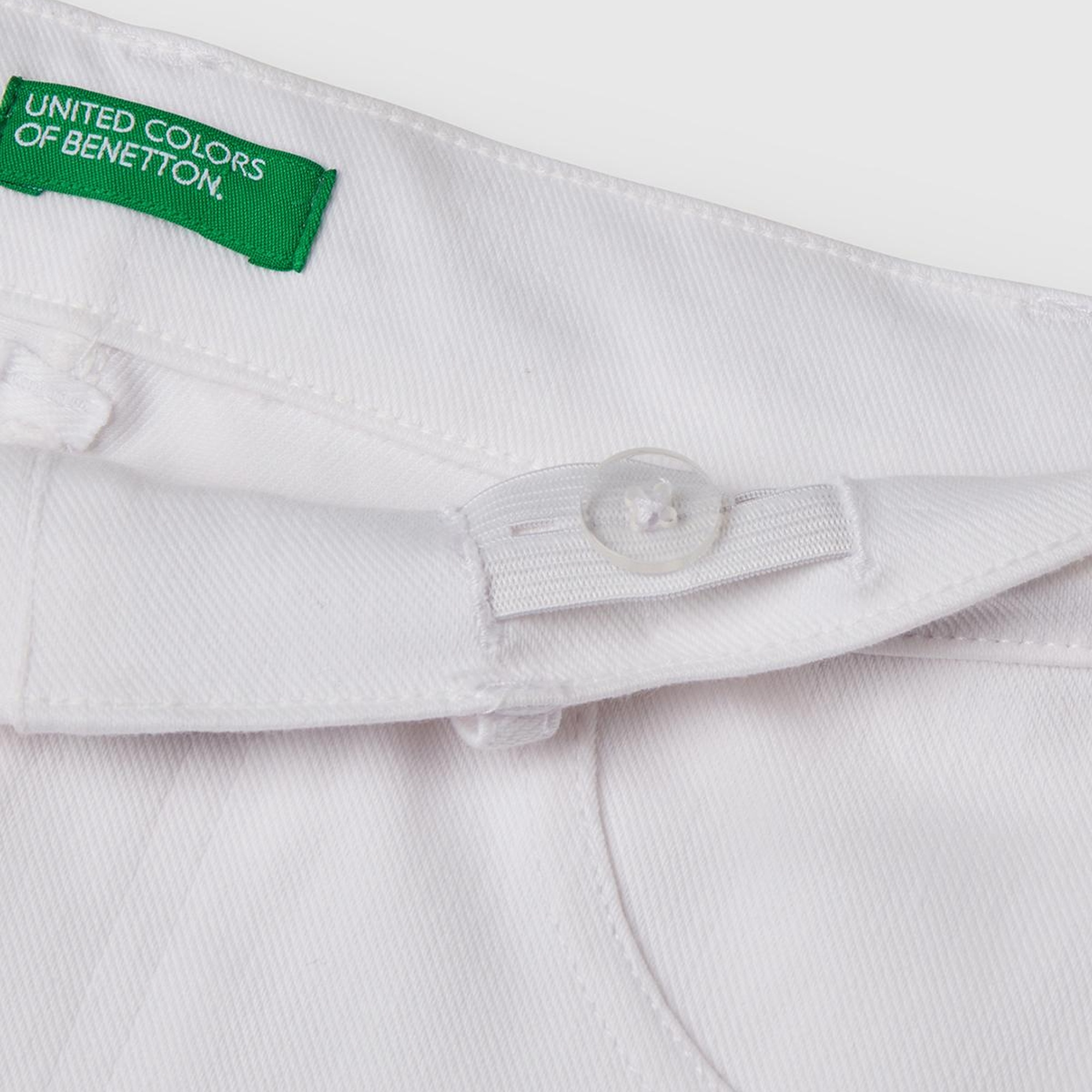 Kız Çocuk Beyaz Streç Kumaş Logo İşlemeli Kloş Pantolon