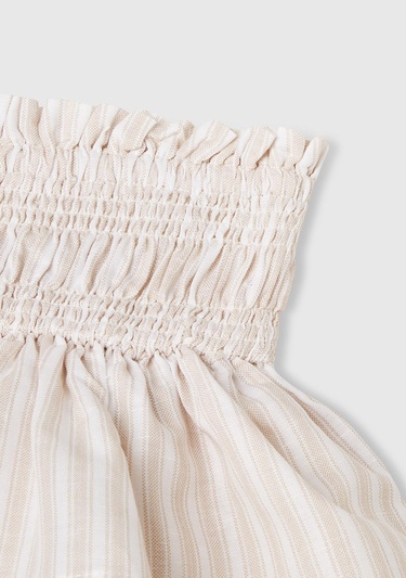  Kız Çocuk Ekru Keten Karışımlı Tamamı Desenli Beli Büzgülü Katlı Etek