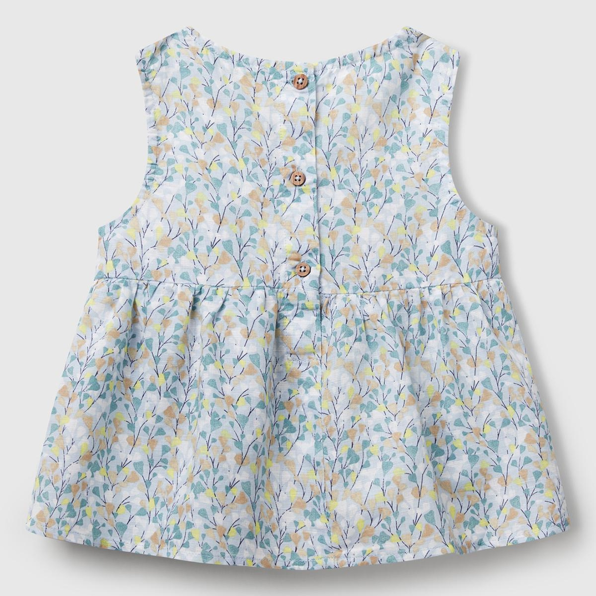 Kız Çocuk Mavi Keten Karışımlı Tamamı Desenli Çiçek Aplikeli Arkası Düğmeli Kolsuz Gömlek