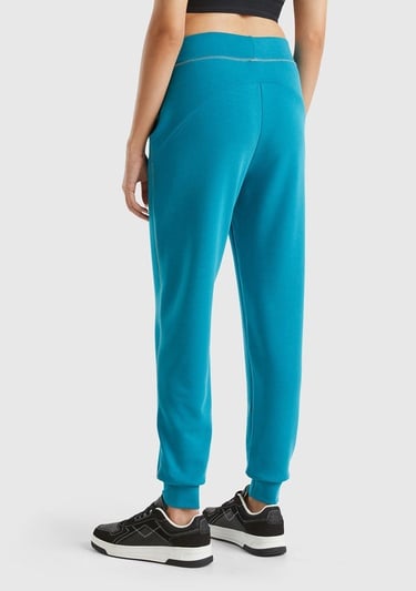  Kadın Turkuaz Modal Karışımlı Önü Logo Detaylı Bilek Manşetli Eşofman Altı