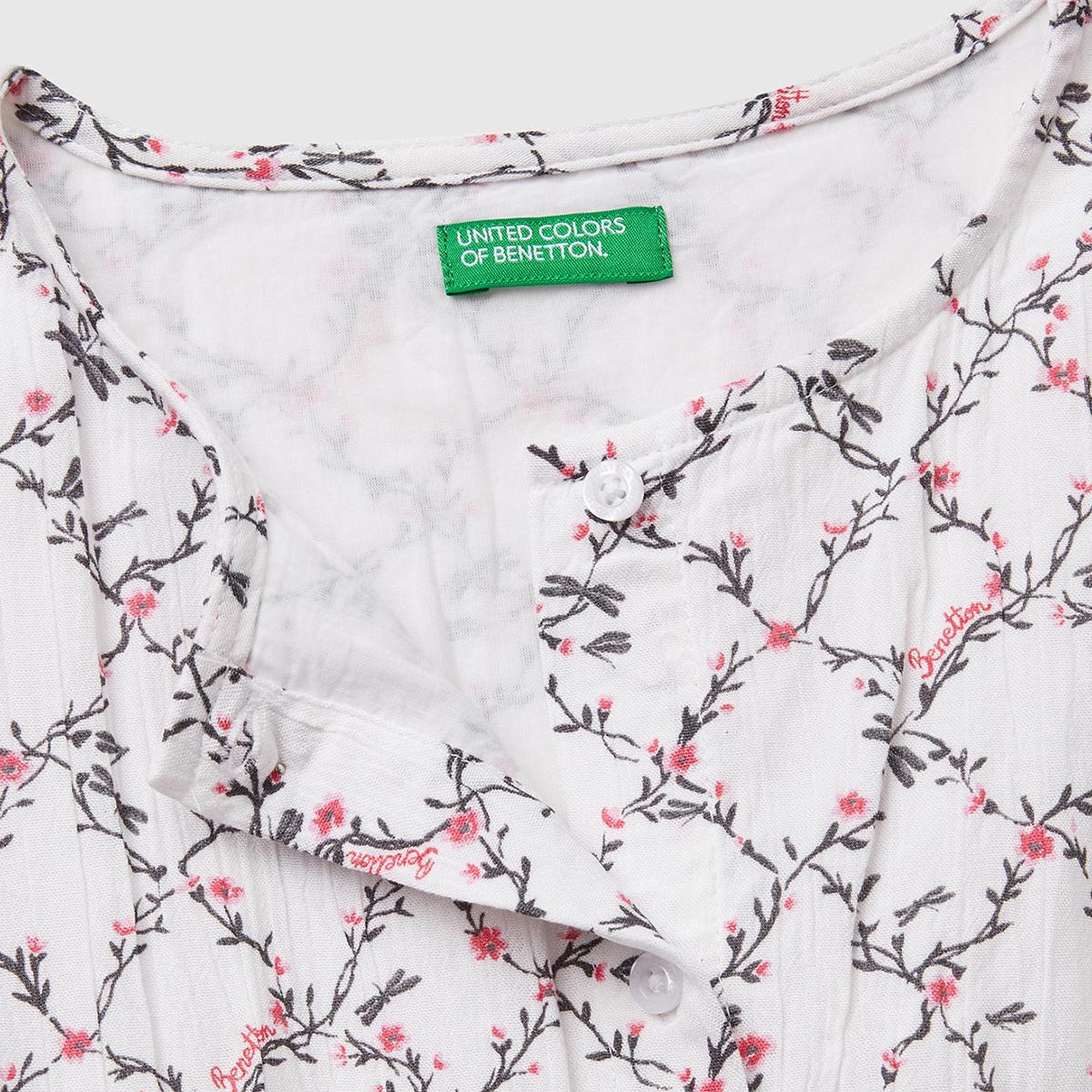 Kız Çocuk Beyaz Mix Viskozlu Desenli Önü Düğmeli Pileli Katlı Kısa Kollu Elbise