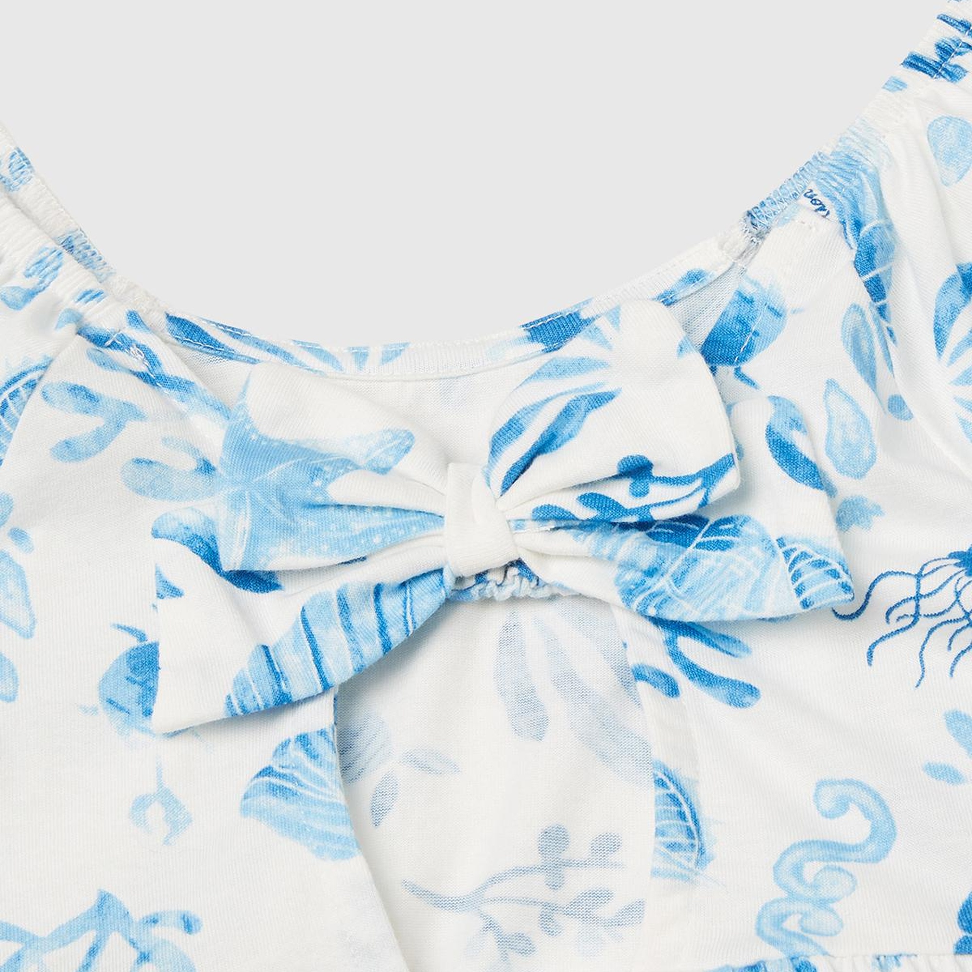 Kız Çocuk Mavi Desenli Önü Fiyonklu Kolları ve Eteği Pileli Elbise