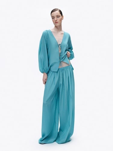  Dökümlü Geniş Paça Pantolon