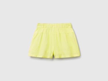  Kız Çocuk Sarı Beli Büzgü İpli Püskül Detaylı Bol Kesim Müslin Şort