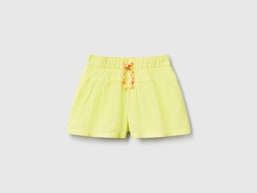 Kız Çocuk Sarı Beli Büzgü İpli Püskül Detaylı Bol Kesim Müslin Şort