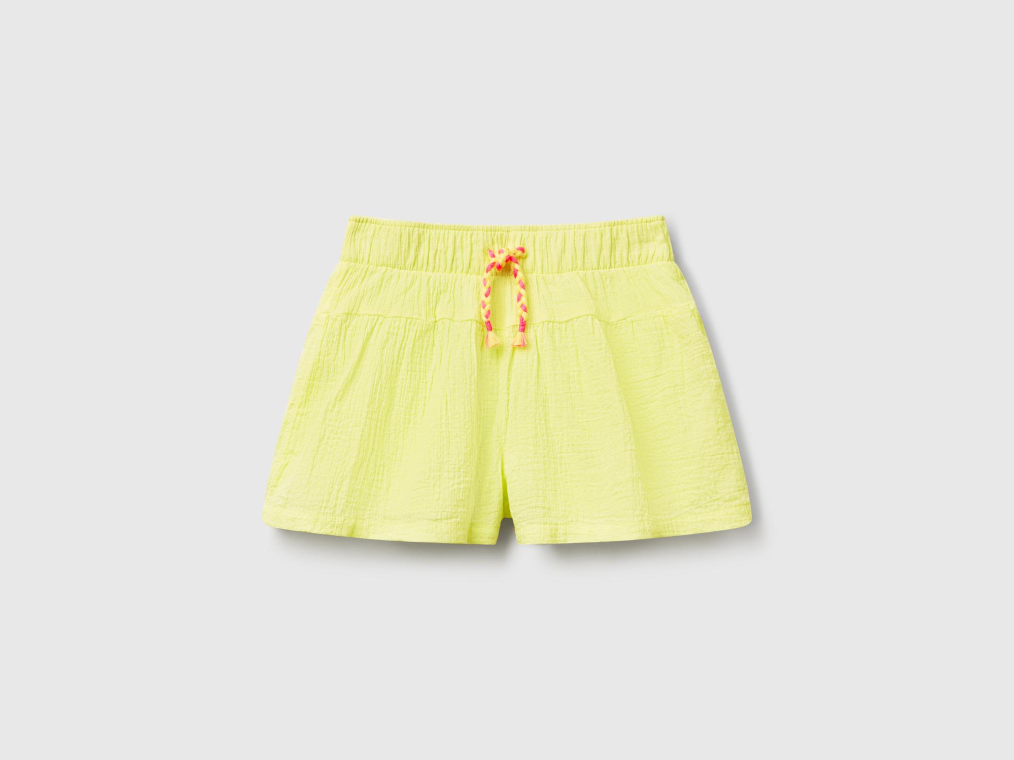  Kız Çocuk Sarı Beli Büzgü İpli Püskül Detaylı Bol Kesim Müslin Şort