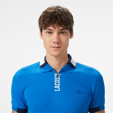  Lacoste Erkek Regular Fit Yarım Fermuarlı Baskılı Mavi Polo