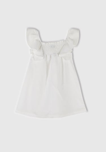  Kız Çocuk Beyaz Keten Karışımlı Çiçek Aplikeli Askısı Fırfırlı Pileli Elbise