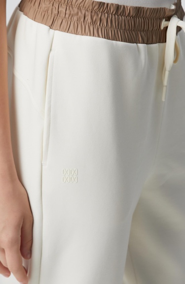  Network Kadın Kırık Beyaz N-Tech Dokuma Garnili Örme Eşofman