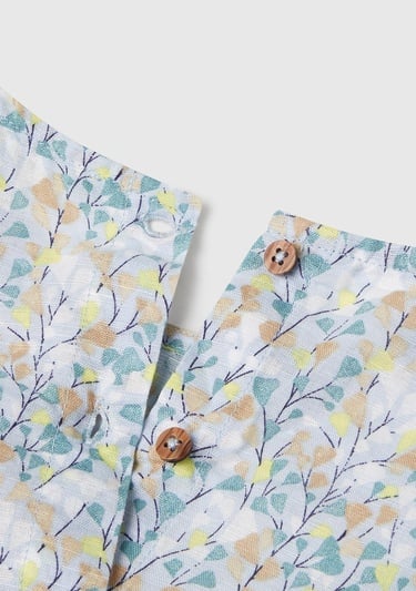  Kız Çocuk Mavi Keten Karışımlı Tamamı Desenli Çiçek Aplikeli Arkası Düğmeli Kolsuz Gömlek