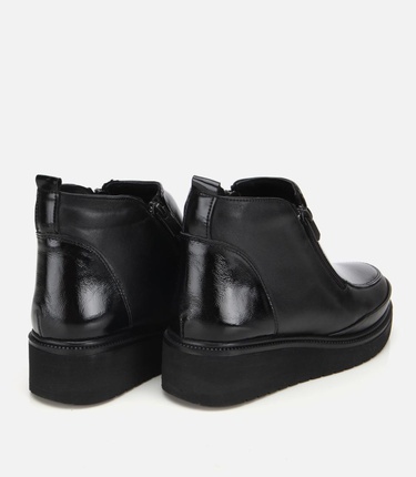  Kadın Deri Siyah Fermuar Detaylı Dolgu Topuklu Bot